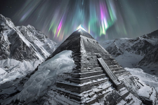 Snow-Draped Pyramid With Majestic Mountains And Vibrant Polar Lights.png